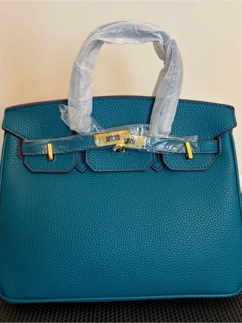 Bleu Jean Real Leather Top-Handle Bag With Gold Hardware.